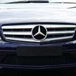 Luxury Branding - Blue mercedes Sedan Near Green Grass Field during Day Time