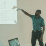 Crowdfunding Graph - Man in classroom