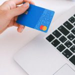 E-commerce Shopping - Person Holding Bank Card