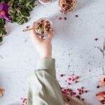 Food Blogger - person holding brown wooden chopsticks
