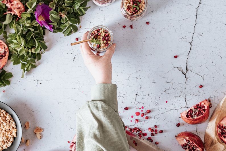 Food Blogger - person holding brown wooden chopsticks