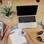 Marketing - MacBook Pro near headphones