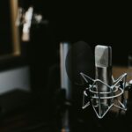 Podcast - macro photography of silver and black studio microphone condenser